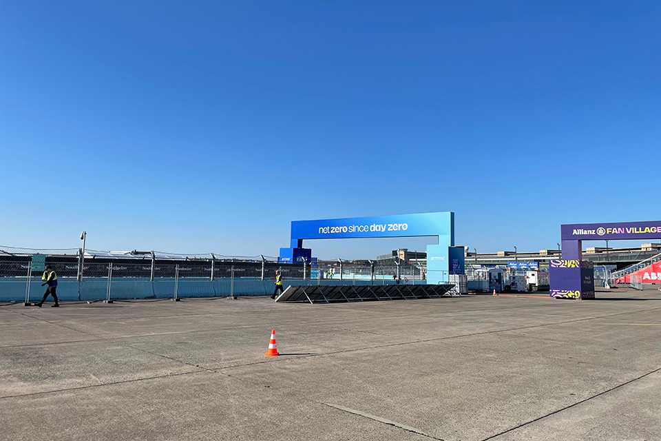 Formula E Branding Berlin 2023: net zero since day zero Torbogen. Allianz Fan Village.